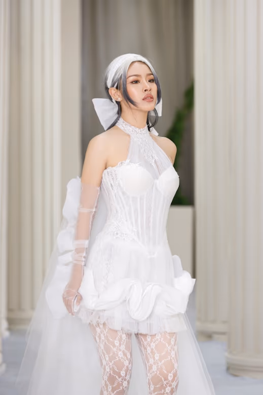 THE SCULPTED HIGH-NECK & RUFFLED BOW